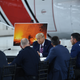 President Donald Trump listens as FEMA workers speak at Sacramento McClellan Airport in McClellan Park, California on Sept. 14, 2020 during a briefing on wildfires.